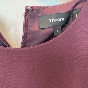 Sleeveless maroon suit dress